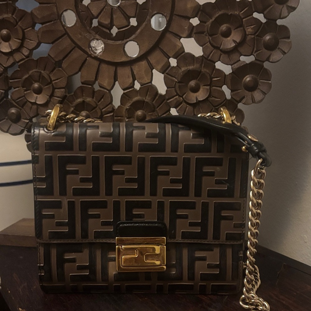 Fendi Black and Brown Crossbody Bag with Gold Accents.